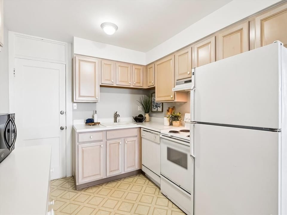 A fully equipped kitchen with ample cabinet space, modern appliances, and everything you need for home-cooked meals.