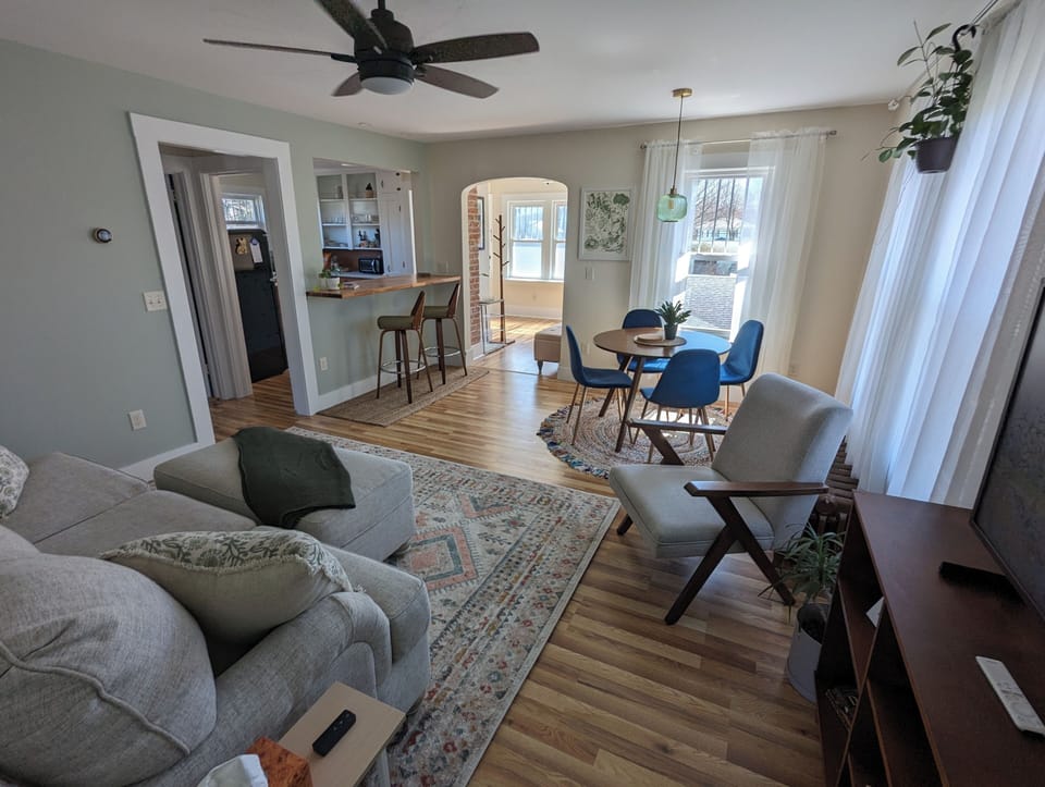 Living room, Dining Room, Breakfast nook, hallway, and foyer from Queen bedroom