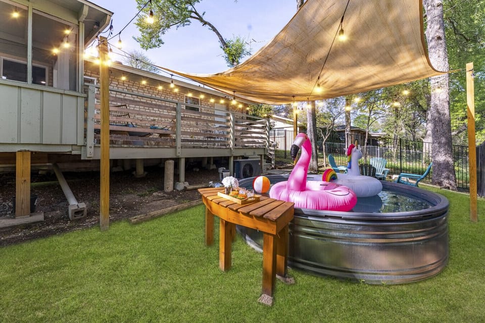 Relax in the covered cowboy pool in the backyard!