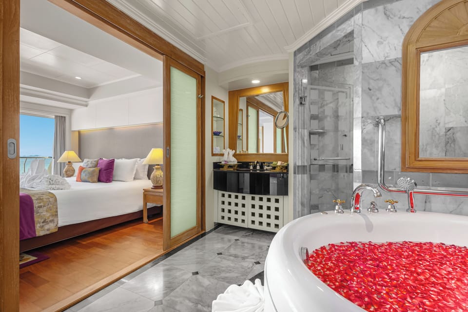 One Bedroom Royal Wing Suite | Bathroom | Separate tub and shower, jetted tub, rainfall showerhead