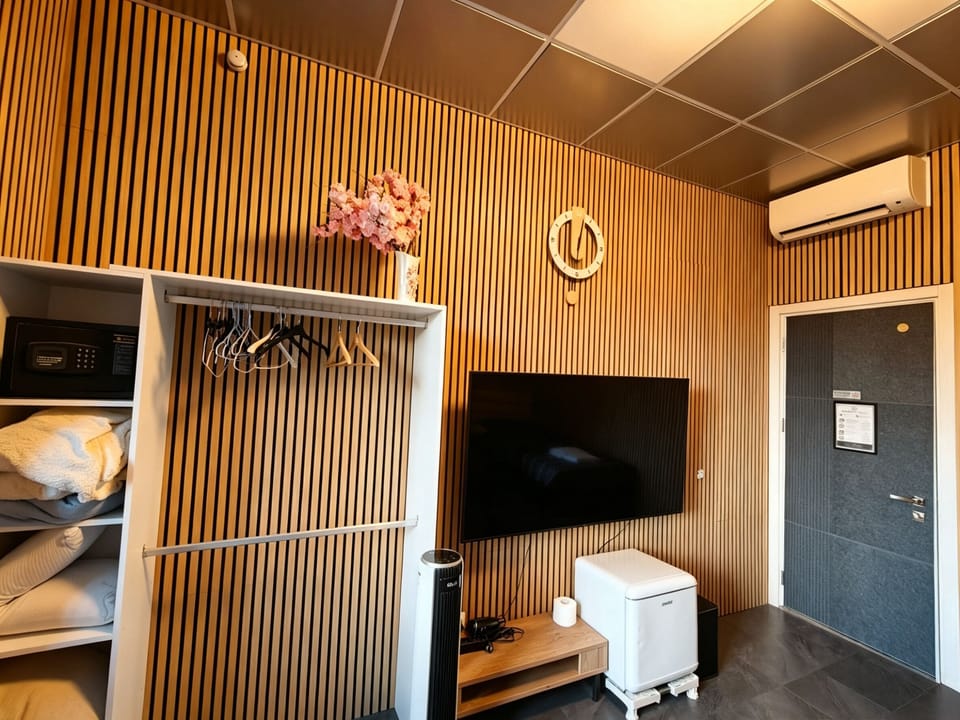 Basic Triple Room, Shared Bathroom | Desk, blackout drapes, iron/ironing board (on request), WiFi (free)