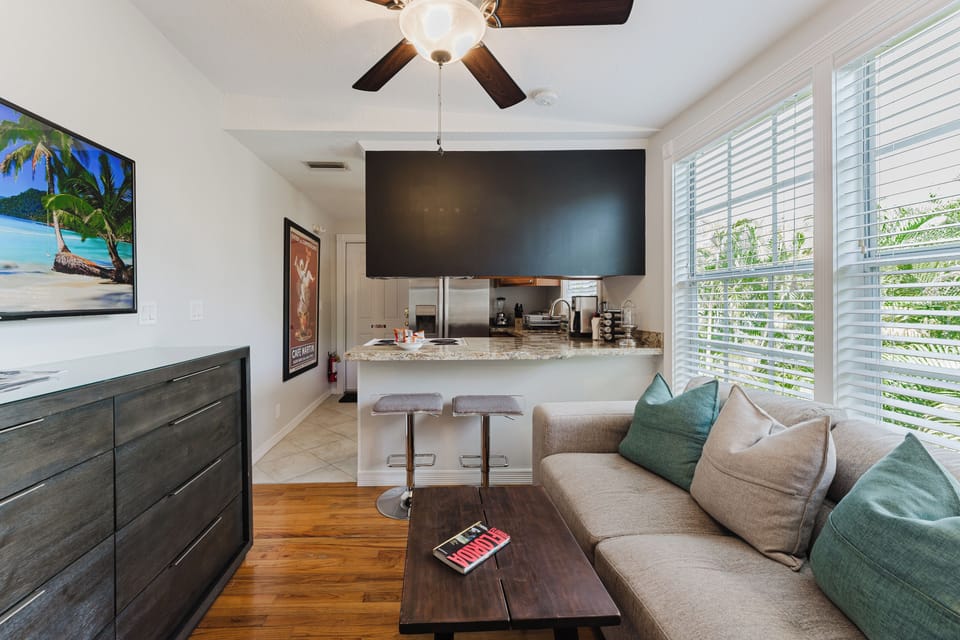 Comfort Apartment, 1 Bedroom, Garden View | Living area | 55-inch Smart TV with digital channels, Netflix, Hulu