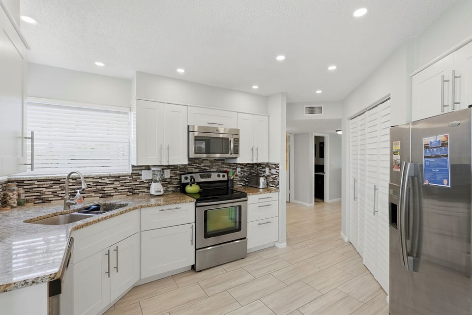 Fully Equipped Kitchen with Stainless Steel Appliances