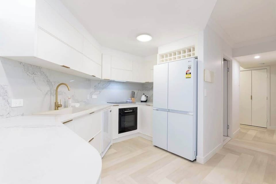 Everything you need is here—modern appliances, thoughtful basics, and a light-filled space to enjoy a homemade meal before a beach walk or rooftop drink.