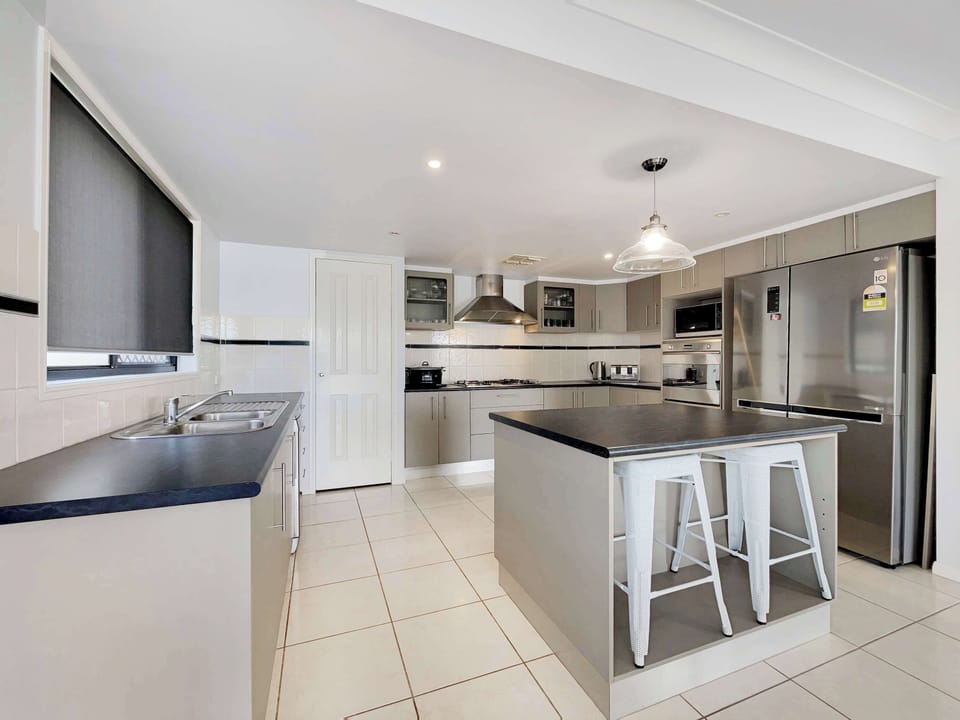 Cook up family favourites or whip up a quick brekkie in the fully equipped kitchen, stocked with all the essentials to make you feel right at home.