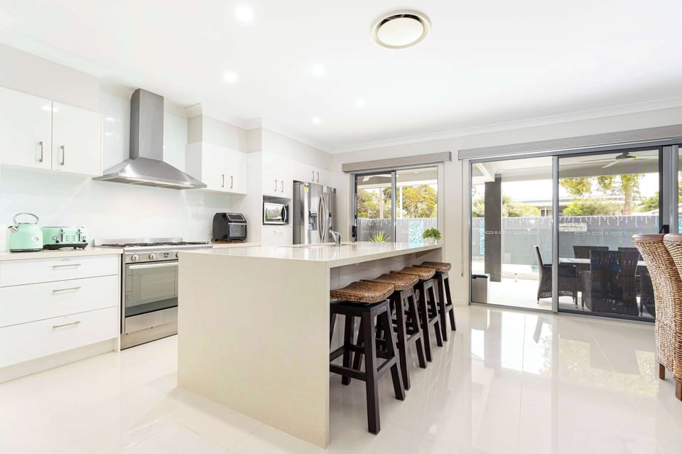 Fully equipped kitchen ready for home style cooking.