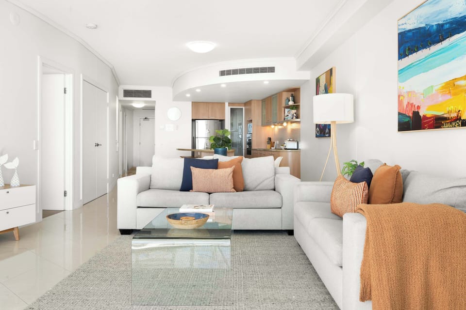 Relax in the stylish living room with two sofas and a smart TV.