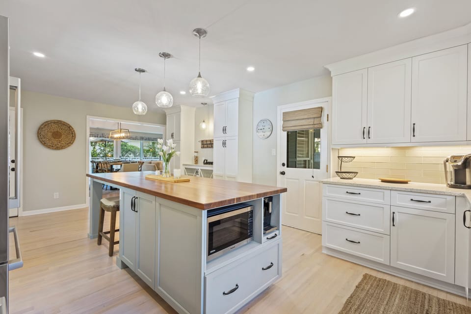 The chef's kitchen, outfitted with top-of-the-line Bosch appliances and custom cabinetry.