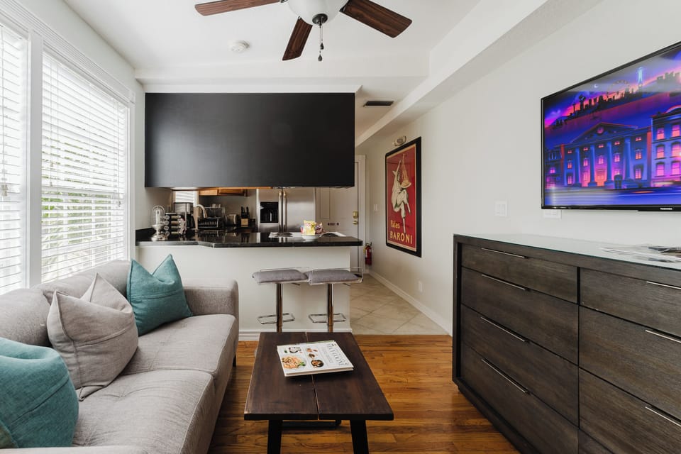 Comfort Apartment, 1 Bedroom, Garden View | Living area | 55-inch Smart TV with digital channels, Netflix, Hulu