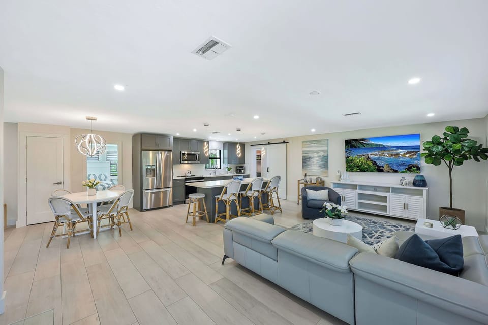Spacious design lets everyone stay connected across the kitchen, dining, and living areas
