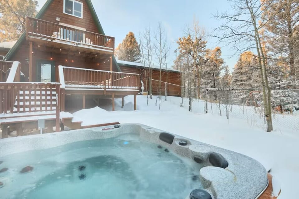 The Hot Tub is nestled among the trees of Pike National Forest with complete privacy.