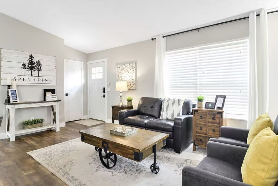 The main floor living space is bright and open to the kitchen and dining room