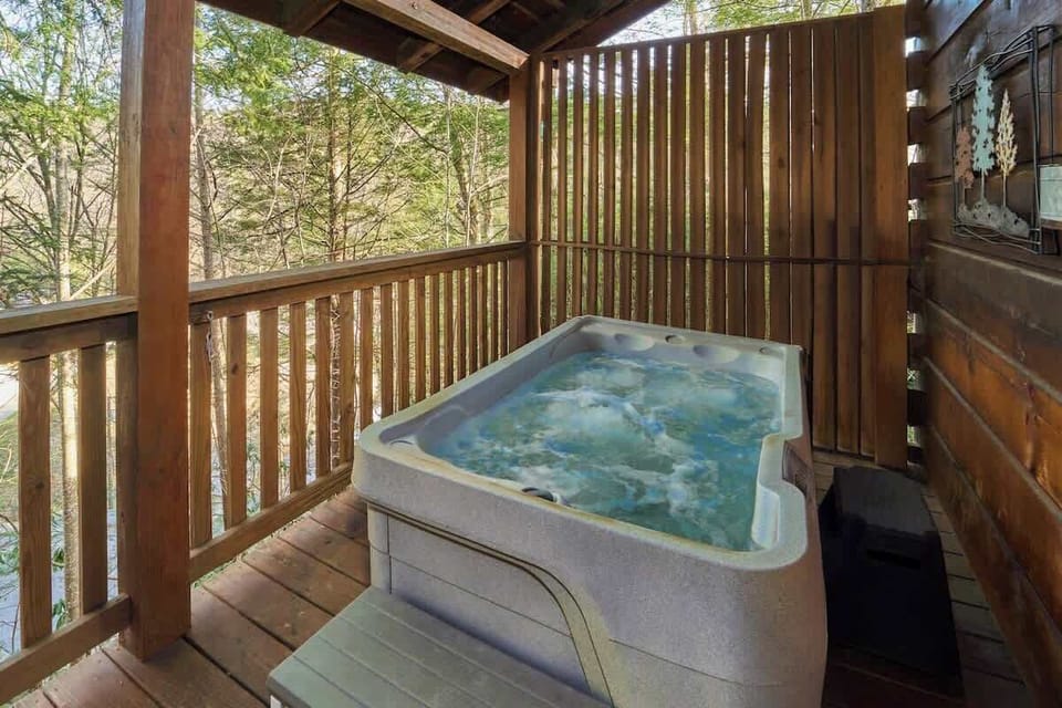 A soothing, private hot tub on the rear deck awaits your arrival.