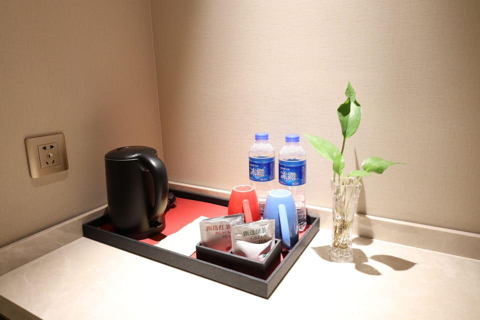 Superior Single Room, City View | Living area | 60-cm TV with cable channels