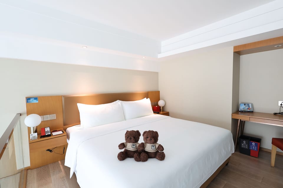 Family Room | Down comforters, in-room safe, blackout drapes, soundproofing