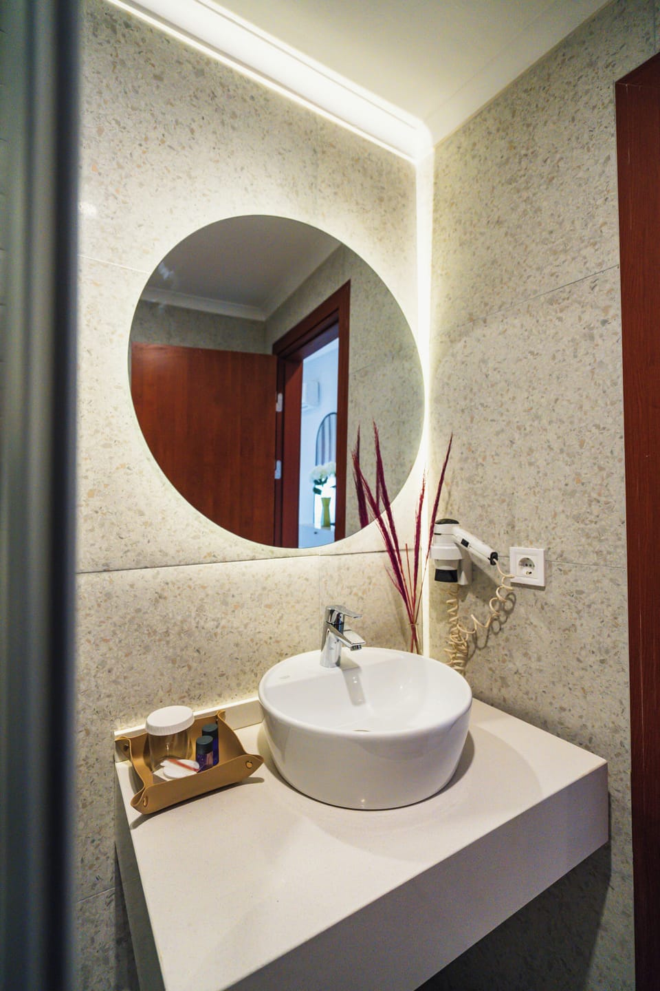 Shower, hair dryer, slippers, towels