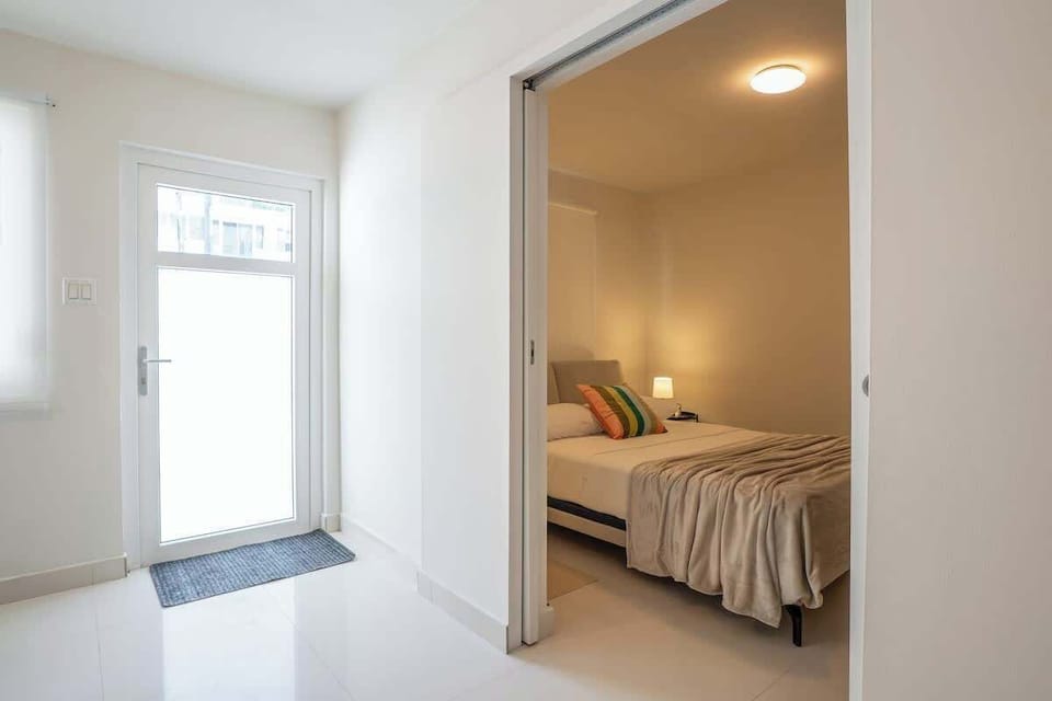Wake up refreshed in a thoughtfully furnished queen bedroom.