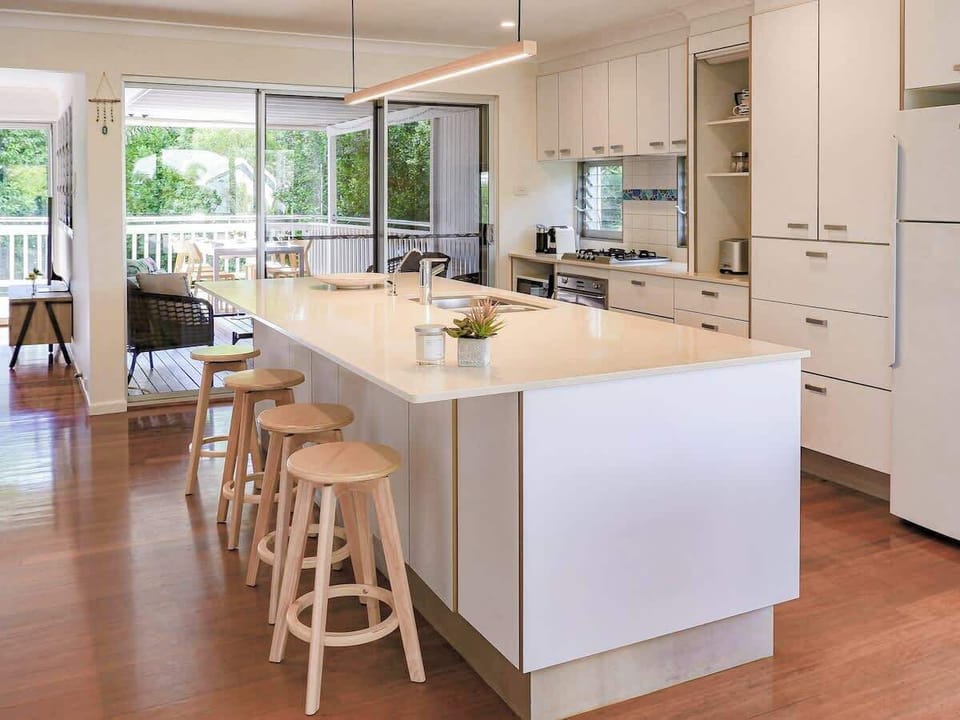 Cook up a feast in the spacious, well-appointed kitchen featuring sleek surfaces and all the essentials.