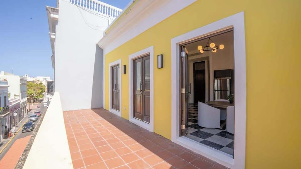 Enjoy views from your private balcony above Old San Juan.