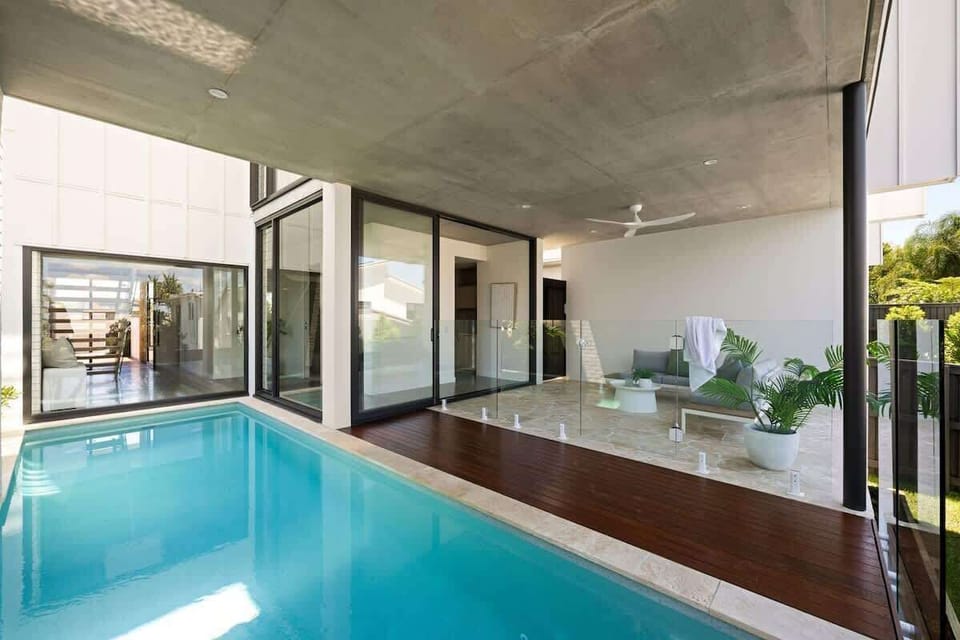 Unwind in your private poolside retreat, perfect for lazy afternoons.