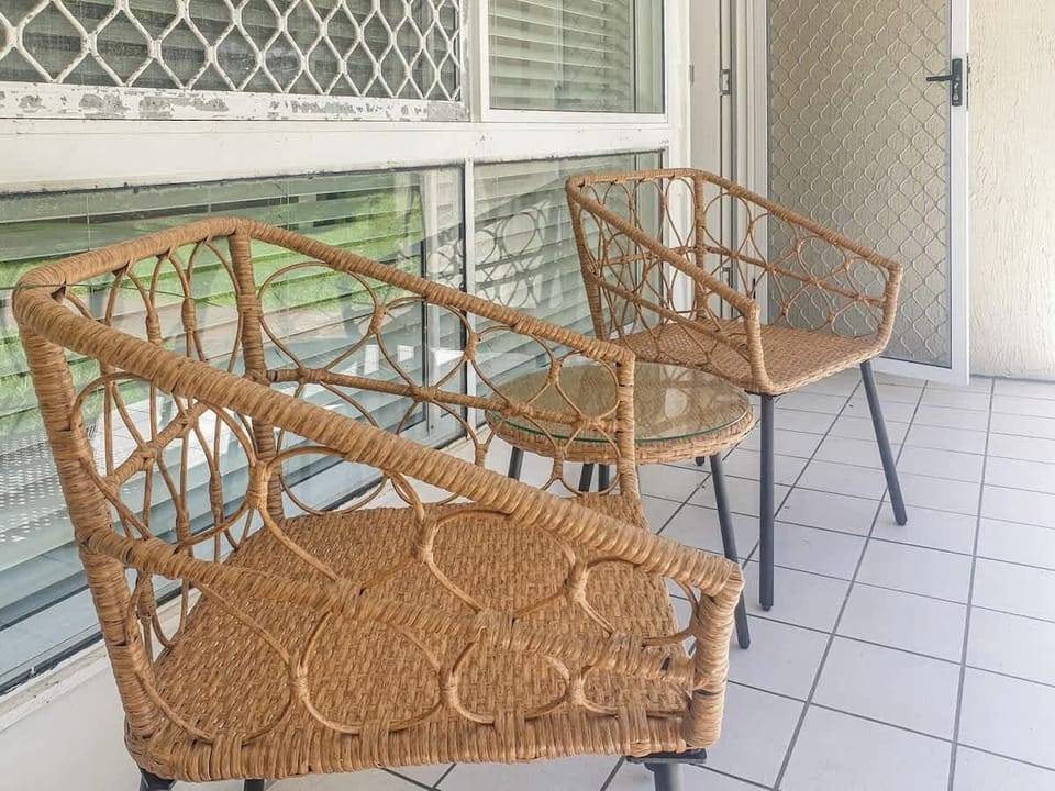 Sit and unwind outside on the patio, a casual setting for coffee or a glass of wine.
