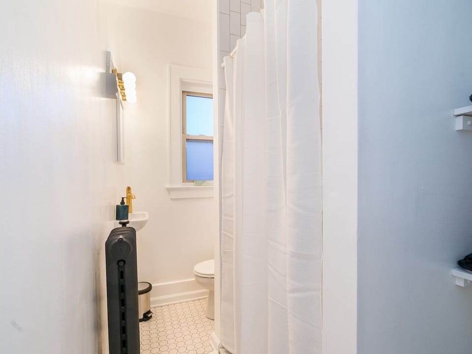 Experience the epitome of comfort and style in the meticulously crafted bathroom. #Washroom #LitUpBath