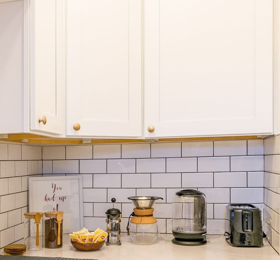 Enjoy a cup of hot coffee prepared with a French Press or a Pour Over .