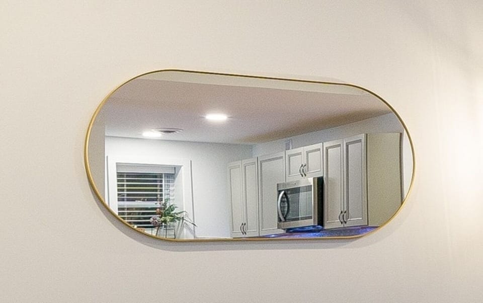 Adorned with elegant wall hangings and a stylish mirror, our space exudes charm and adds a touch of sophistication to your surroundings.  #ReflectHappiness #WallMirror 
