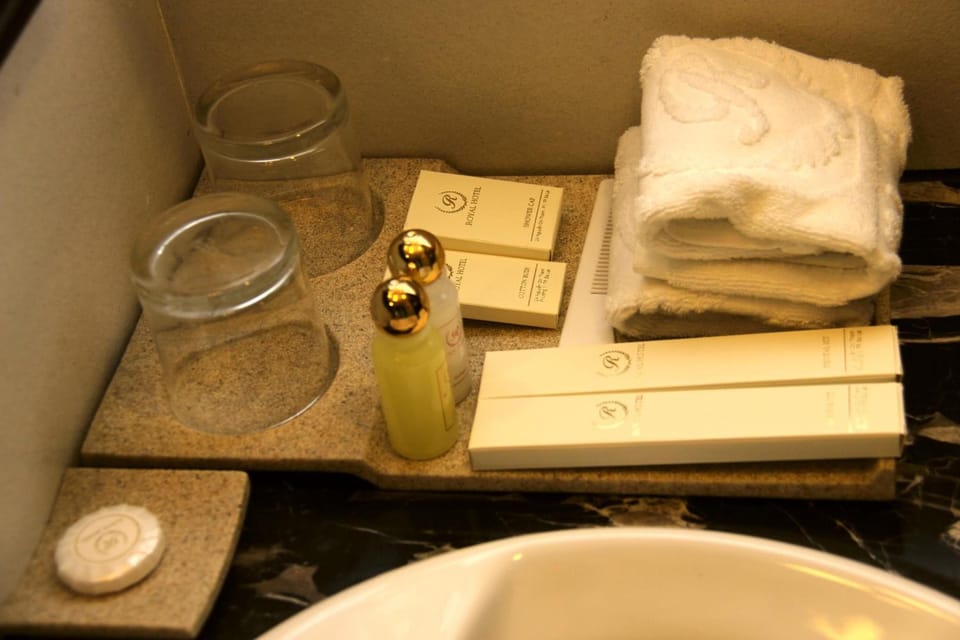 Shower, free toiletries, hair dryer, slippers