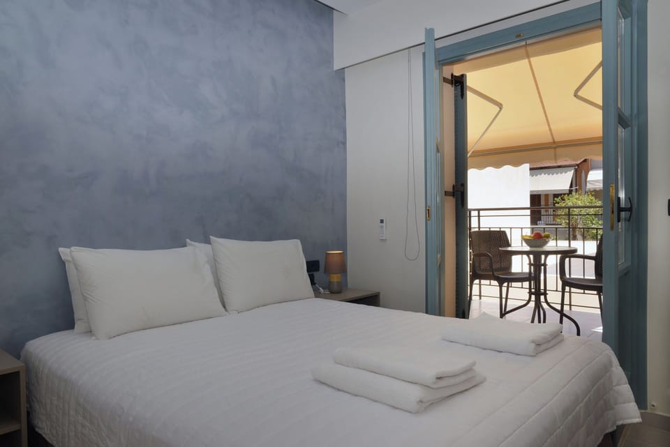 A Light-Filled Bedroom with City Views
