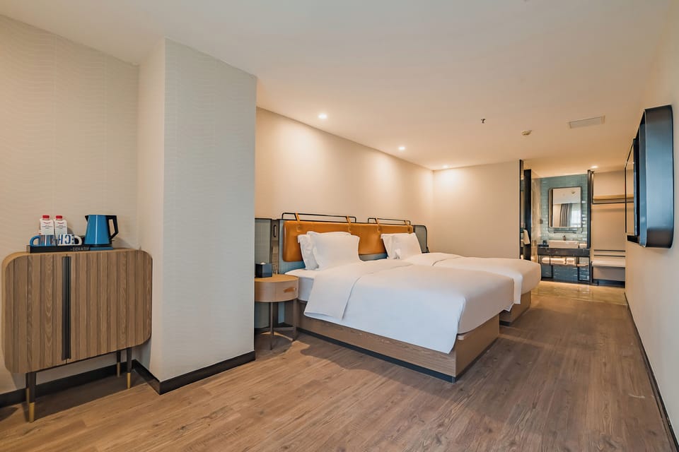 Luxury Twin Room, City View | Desk, laptop workspace, free WiFi, bed sheets