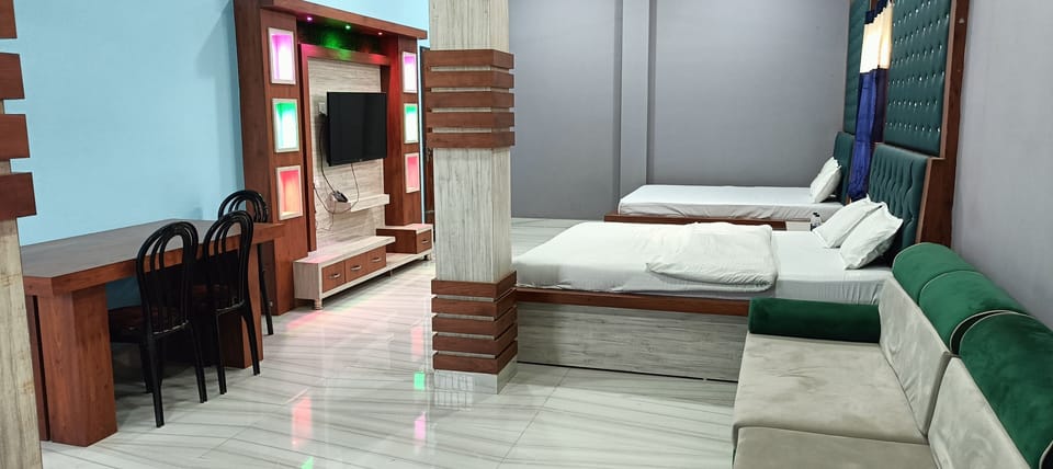 Executive Quadruple Room | Egyptian cotton sheets, premium bedding, down comforters