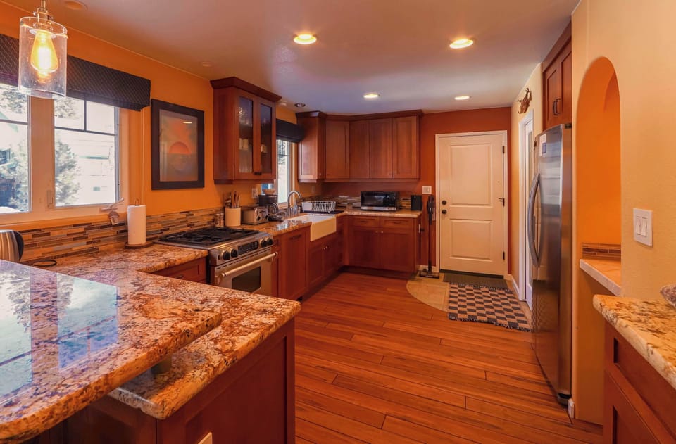 House, Multiple Beds, Fireplace, Mountain View (Tahoe Trail Retreat) | Private kitchen | Fridge, oven, stovetop, dishwasher