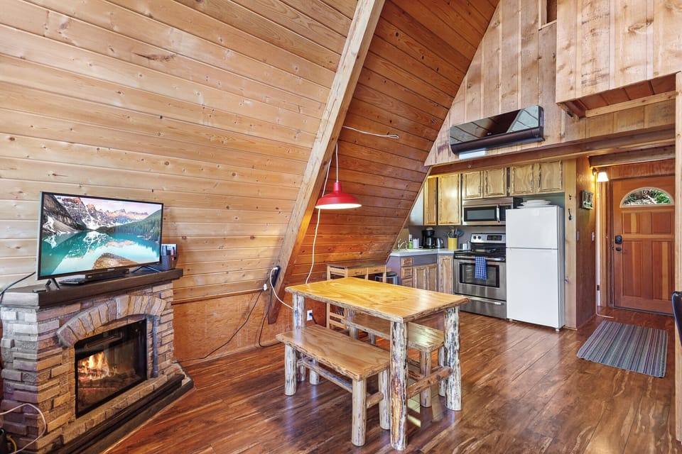 The dining area is adjacent to the kitchen
