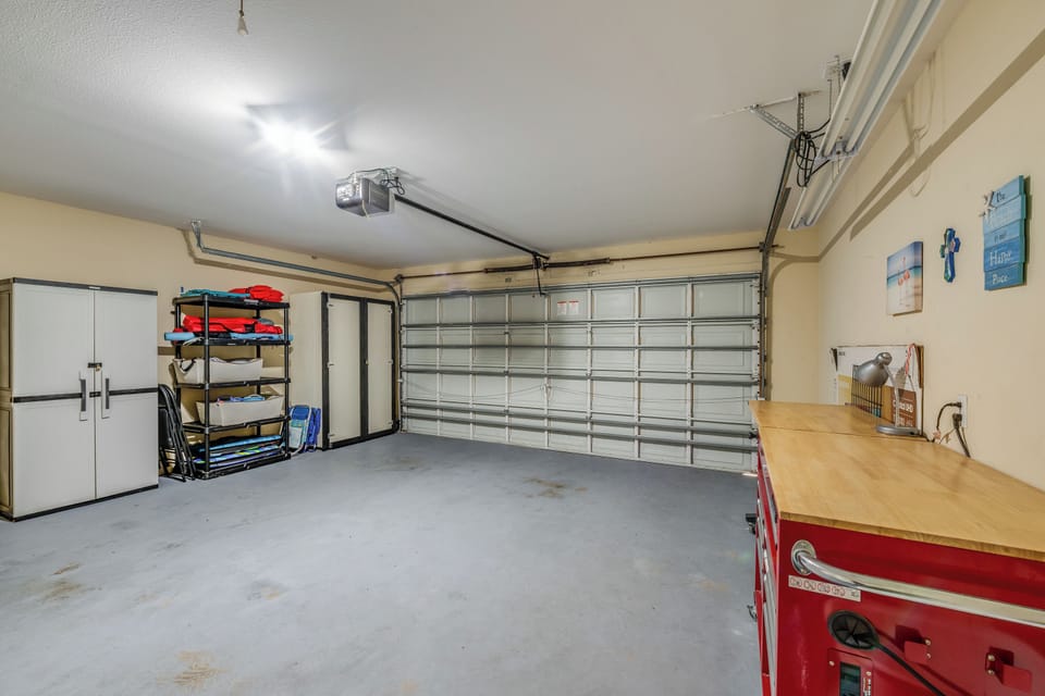 Spacious garage with organized storage and workspace keeps your gear secure and adventure-ready.