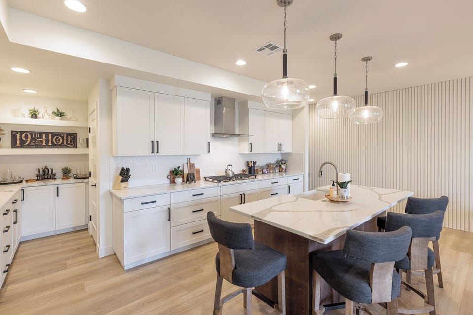 Kitchen - The Kitchen Island comfortably seats 4 adults and creates a great space for serving and preparing meals.