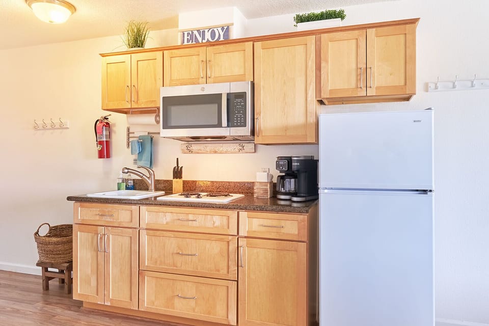 Bright and inviting kitchenette perfect for those quick meals.