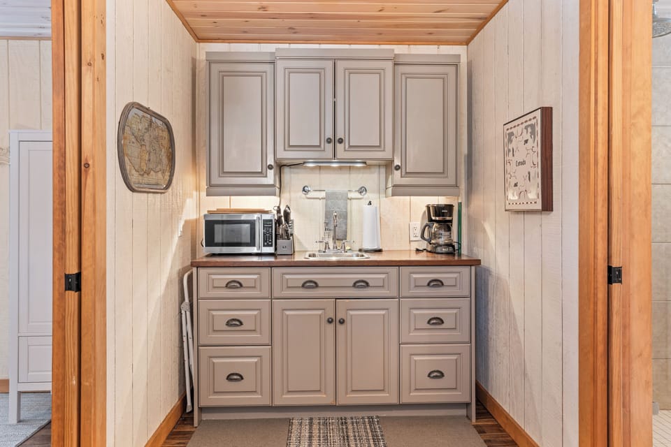 A cute & quaint kitchenette has everything you need- very well equipped!