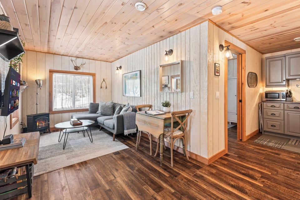 Comfy living in a spacious & rustic cottage feel with warm wood accents.