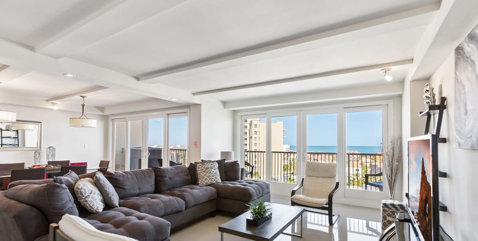 Panoramic Apartment, 3 Bedrooms, Balcony, Ocean View | Living area | 50-inch Smart TV with cable channels