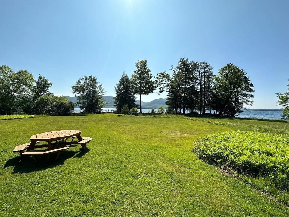 Picnic table in the backyard overlooking the Lake.
