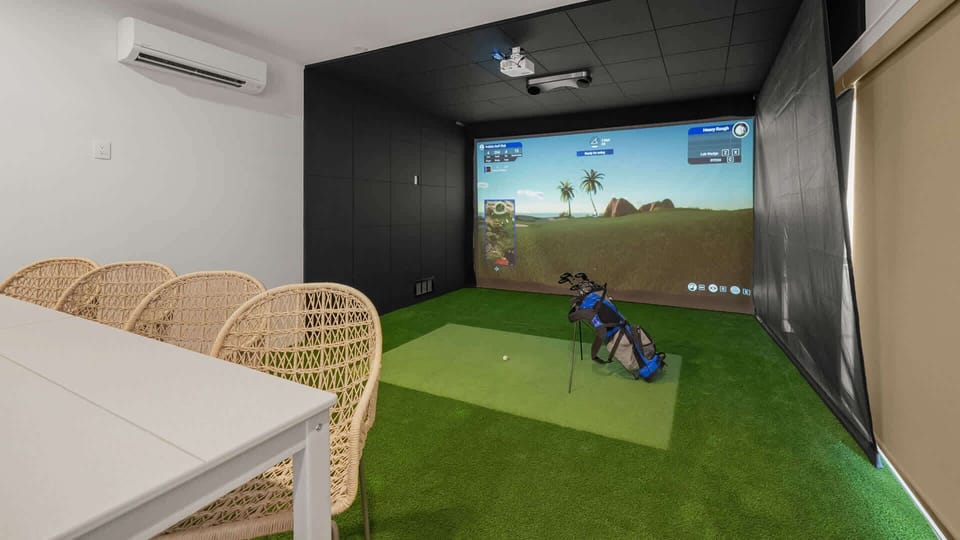 Media Center - Features 2-Large HDTV's Soft Seating, Bar top Seating and Sports Simulator