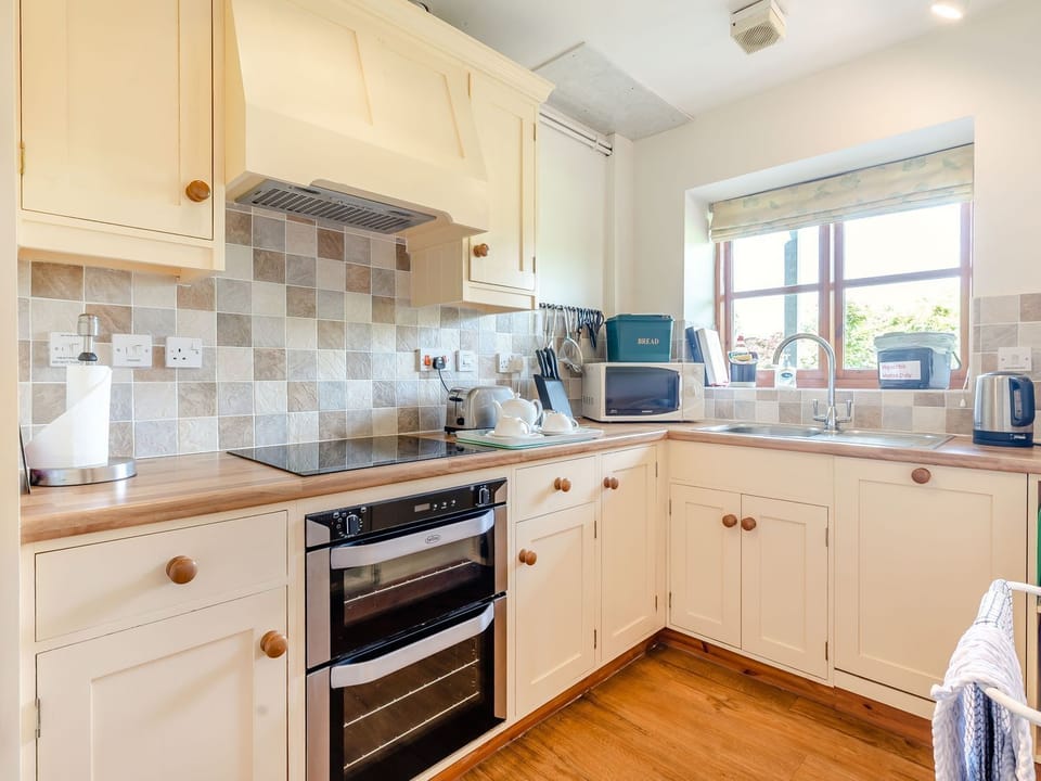 Fridge, microwave, cookware/dishes/utensils
