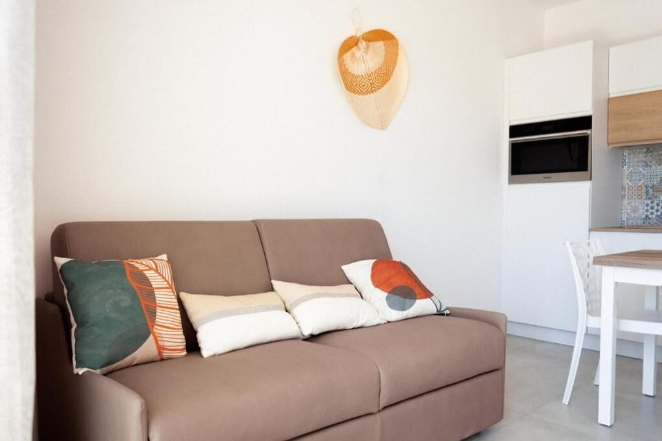 Classic Apartment, Garden View | Living area | Flat-screen TV