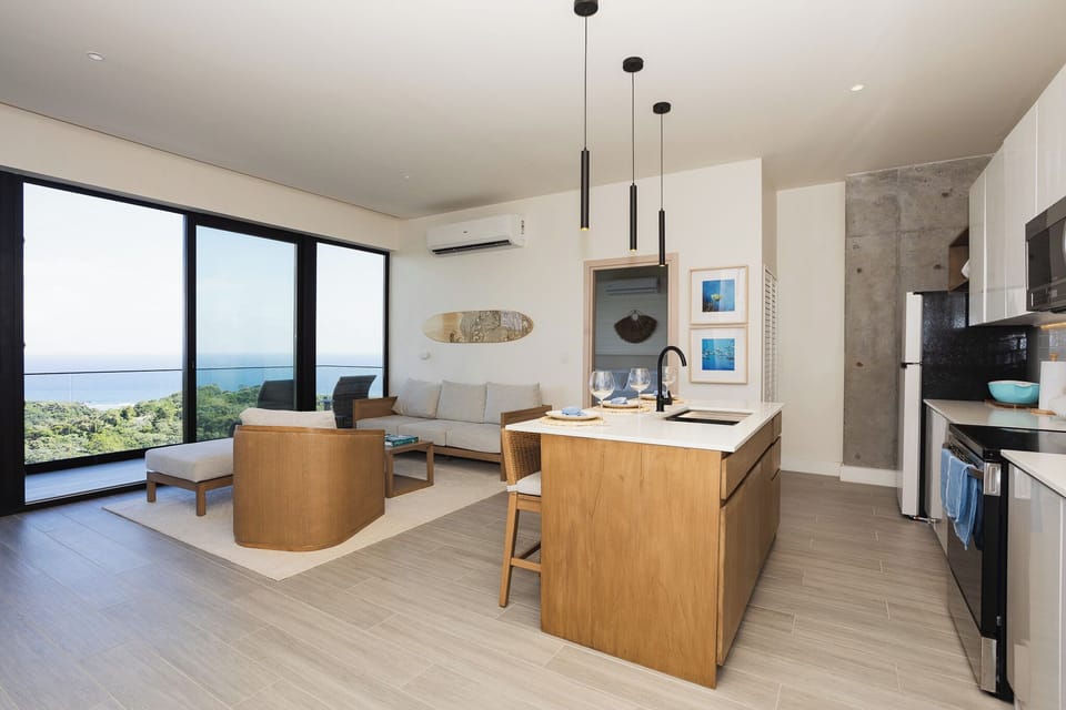Luxury Apartment, Balcony, Ocean View | Living area | 50-inch Smart TV with cable channels