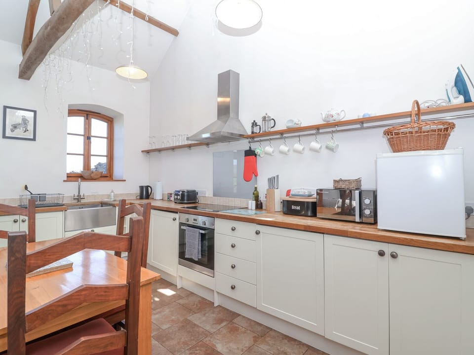 Fridge, microwave, cookware/dishes/utensils