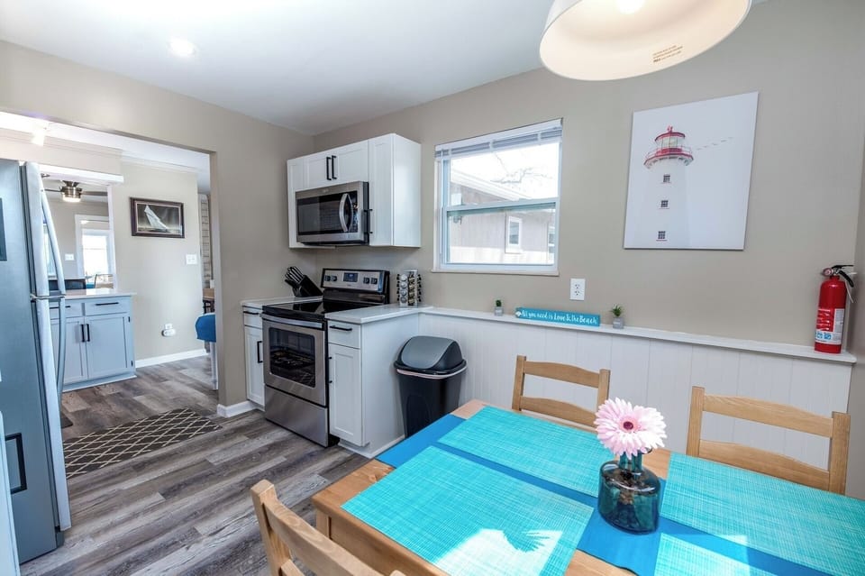 Cozy dining nook! All new stainless steel appliances.