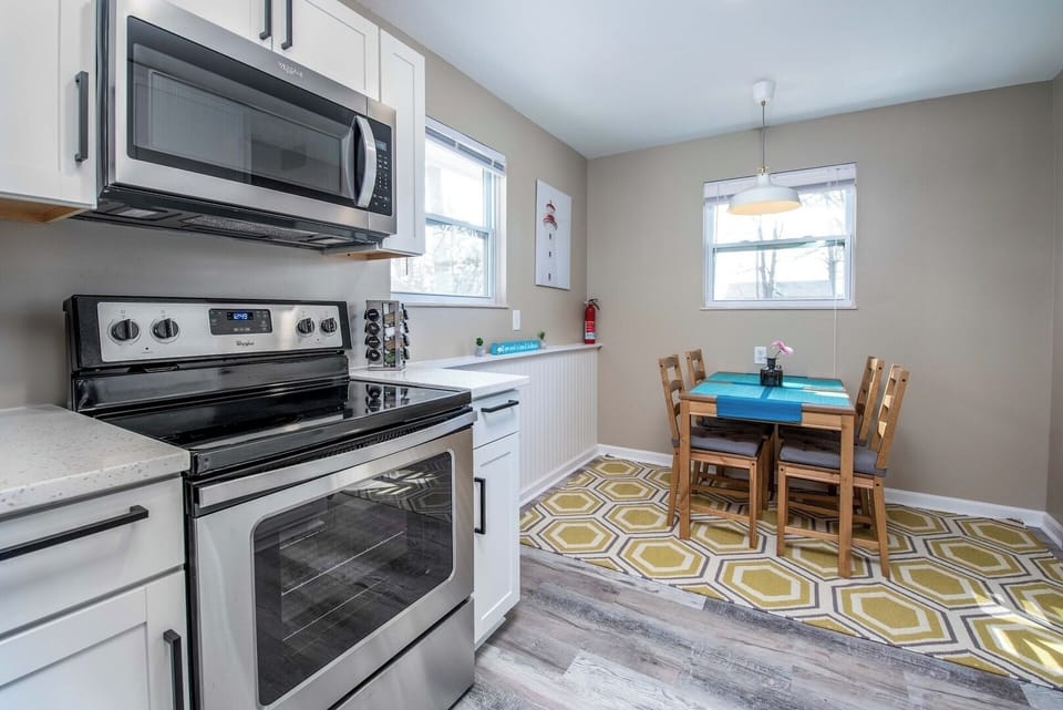 Cozy dining nook! All new stainless steel appliances.
