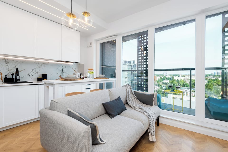 Superior Apartment, Balcony, City View | Living area | 50-inch Smart TV with cable channels, Netflix, streaming services