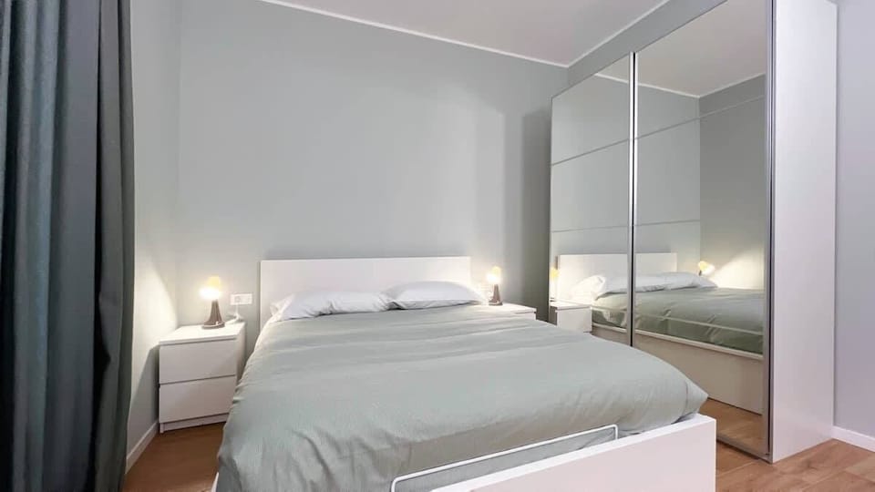 Modern bedroom with walk-in closet